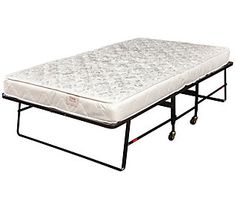 the mattress is sitting on top of an iron frame with casteors and wheels for easy storage