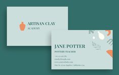 two business cards with the words artisan clay academy on them and an orange vase