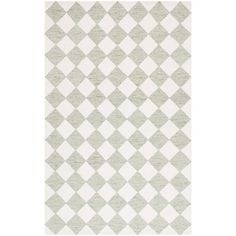 a white and grey rug with squares on it, in the shape of an argyle pattern