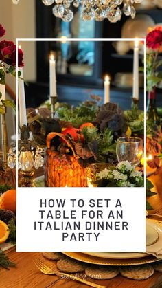 a table set for an italian dinner party with candles, flowers and fruit on it