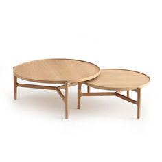 two wooden tables sitting next to each other on top of a white surface with no one in it