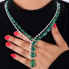 Luxury Pear-shaped Diamond Emerald Necklace, Luxury Pear-shaped Emerald Necklace With Diamonds, Elegant Green Pear-shaped Diamond Necklace, Luxury Pear-shaped Emerald Necklace In White Gold, Luxury Pear-shaped White Gold Emerald Necklace, Formal Pear-shaped Emerald Necklace, Dazzling Formal Emerald Gemstone Necklace, Formal Pear-shaped Emerald Necklace Fine Jewelry, Luxury Hand Set Emerald Diamond Necklace