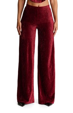 Start off your look with a chic base layer, wearing these wide-leg pants crafted from soft pleated velvet Elastic waist 90% polyester, 10% spandex Hand wash, line dry Imported Burgundy Bottoms For Fall Party, Burgundy Party Bottoms For Fall, Fall Party Burgundy Bottoms, Burgundy High Waist Wide Leg Pants For Fall, Stretch Burgundy Pants For Party, High Waist Burgundy Wide Leg Pants For Fall, Burgundy Wide Leg Pants For Party, Chic Burgundy Pants For Party, Chic Burgundy Party Pants