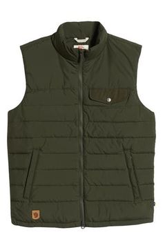 The layering possibilities are endless with this versatile down vest that offers tons of warmth and powerful protection against the elements. 26 1/2" length (size Medium) Lined, with down fill 100% polyester Machine wash, tumble dry Imported Outdoor Puffer Vest Jacket Sleeveless, Nylon Hiking Vest For Fall, Outdoor Puffer Vest With Down Filling, Fall Hiking Nylon Vest, Outdoor Puffer Vest Made Of Down, Outdoor Down Puffer Vest, Outdoor Puffer Vest, Casual Nylon Vest For Outdoor Work, Outdoor Quilted Down Vest