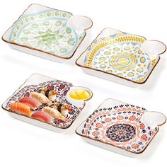 four plates with different designs on them, one has sushi and the other has fish