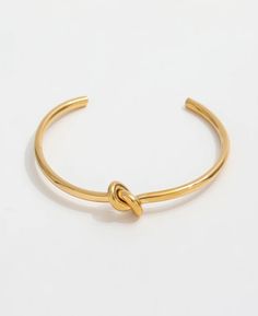 Minimalist Gold Knot Cuff Bracelet, Gold Cuff Bracelet, Gold Tie Knot Bracelet, Gold Minimalist Cuff, Gold Minimalist Bracelet, Gold Stacking Bracelet, Bridesmaid Bracelet, Bridesmaid Jewelry, Bridesmaid Gift, Ready to Ship, Tie the Knot Gift✦ 18k gold plated no tarnish water proof ✦ Size: Approximately 2.25 inches inner diameter ✦ Inner Circumference (wrist): ~6.5" inner circumference ✦ 3mm thick Adjustable Minimalist Bangle Bracelet, Minimalist Metal Cuff Bracelets, Adjustable Minimalist Metal Cuff Bracelet, Simple Cuff Bangle Bracelet As Gift, Adjustable Bangle Bracelet With Simple Design, Simple Adjustable Bracelet Bangle, Simple Bangle Cuff Bracelet Gift, Simple Adjustable Bangle Bracelet, Adjustable Simple Cuff Bracelet As Gift