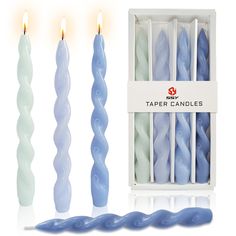 three blue candles are next to each other