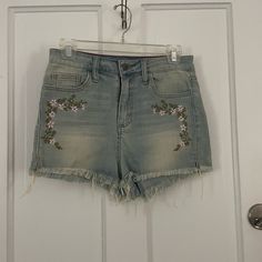 Embroidered Shorts With A Raw Hem. Never Worn. Embroidered Denim Blue Bottoms For Spring, Spring Embroidered Denim Blue Bottoms, Casual Denim Blue Bottoms With Floral Embroidery, High Waist Embroidered Denim Blue Bottoms, High Waist Denim Bottoms With Floral Embroidery, Summer Embroidered Cotton Jeans, High Waist Embroidered Bottoms For Spring, High Waist Blue Jeans With Floral Embroidery, High-waist Blue Jeans With Floral Embroidery