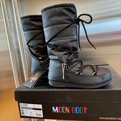 Brand New With Tags Attached. Never Worn, No Flaws. Authentic Moonboots Style Is Classic Original High In Nylon Color Is All Black Waterproof. Moon Boot Logos Throughout. Unisex Sizing Men’s Size 3.5 / Women’s 4.5 Msrp $210 + Tax Price Firm. Use Code “ Kelsidcloset ” To Save $10 Off Your 1st Order Bundle Multiple Items To Save On Shipping Same Day Shipping Top Rated Seller & Poshmark Level 2 Ambassador Shop More Closeouts At Kelsid.Com Waterproof Lace-up Nylon Boots, Black Weatherproof Boots For Winter Sports, Waterproof Round Toe Boots For Winter Sports, Waterproof Nylon Boots For Cold Weather, Winter Walking Rain Boots With Round Toe, Sporty Waterproof Boots For Cold Weather, Sporty Black Boots For Winter Sports, Winter Hiking Boots With Padded Ankle, Casual Weatherproof Boots For Winter Sports