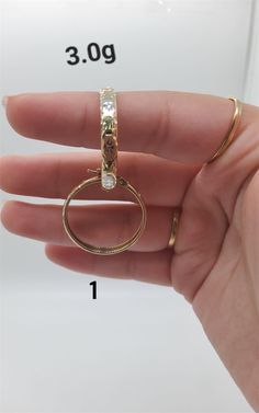 A 10k hoop earrings is a versatile piece of jewelry that blends durability with elegance. Perfect gift for any occasion. Elegant Hinged Huggie Earrings For Gift, Gold Plated Small Hoop Rings As Gift, Gold Hoop Earrings Stamped 14k For Gift, Small Hoop Gold Plated Rings As Gift, Gold Hoop Earrings Stamped 14k As Gift, Gold 14k Stamped Hoop Earrings As Gift, Classic Hinged Huggie Earrings, 14k Gold Stamped Huggie Earrings Gift, Classic Hinged Huggie Earrings Gift