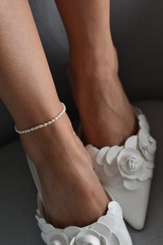 Pearl Ankle Chain. For wedding or special occasion.  Pearl Ankle Chain will perfectly highlight your chic style. Perfect Gift for Yourself and Your Loved ones. Perfect gift for birthday, anniversary, bridesmaids, graduation, friendship, sisters. The chain measures approximately 19cm with the option to extend the piece with the 5cm extender chain. Details: - Freshwater Pearls- 3.5-4mm - Extender-16k gold plated copper Real colors may slightly differ from their appearance on your display, as it depends on your monitor settings. Pearl Chain Anklet For Party, Elegant Pearl Chain Anklet For Party, Elegant Pearl Anklets For Party, Delicate Pearl Bracelet For Party, Delicate Pearl Bracelet For Wedding, Delicate Pearl Chain Anklets, Elegant Pearl Beaded Anklets, Adjustable White Pearl Anklets, Elegant Beaded Anklets With Ankle Strap