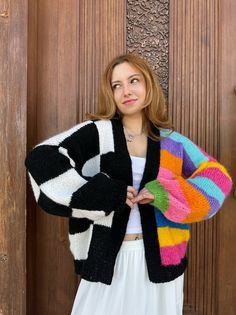 Trendy Black Acrylic Cardigan, Knitted Acrylic Cardigan For Cold Weather, Trendy Winter Color Block Cardigan, Casual Multicolor Winter Cardigan, Winter White Color Block Cardigan, Multicolor Knitted Cardigan For Fall, Trendy Acrylic Cardigan For Cold Weather, Black Knitted Acrylic Cardigan, Winter Color Block Layering Cardigan