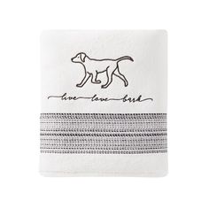 a towel with a dog on it and the words live love laugh written in black ink