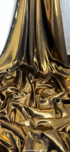 "1 mtr black/gold shimmer on satin fabric This is quality fabric and is silky satin fabric It is 58\" wide (147cm) This is ideal for dress making lining,bridal dress lining, waiste coat,decorations,table runners, and many other projects If more than one quantity is bought it will be sent in one continous length All items are dispatched within one working day (Please note i try my best to get exact color of the fabric there might be a slight different in color due to different montior screens and camera lighting) Any questions feel free to ask and please take time to look at my shop" Black Gold Fabric, Black Satin Aesthetic, Royal Picnic, Gold Clothes, Gold Drapes, Dress Lining, Decorations Table, Bridal Fabric, Gold Satin