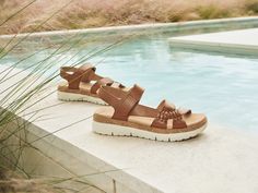 The Ilena strappy sandal is the perfect wardrobe essential! This ultra lightweight sandal features an adjustable ankle strap, arch support and a flexible outsole. Perfect for all-day walking! Vacation Sport Sandals With Ankle Strap And Removable Insole, Summer Double Strap Sandals With Cork-bed Midsoles, Casual Sport Sandals With Heel Strap For Vacation, Spring Sport Sandals With Double Straps, Vacation Sport Sandals With Heel And Ankle Strap, Casual Sport Sandals With Heel Strap For Beach, Spring Sport Sandals With Ankle Strap, Spring Ankle Strap Sport Sandals, Summer Strappy Sport Sandals With Arch Support