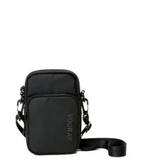 Get the Deets: 8" tall x 5" wide x 2" deep Main compartment: 5 W x 8 H Front pocket: 5 W x 6 H Main compartment holds up to 3 L. Two separate carrying compartments. Front pocket includes an elastic key/wallet clip. Removable, adjustable shoulder strap with swivel clips. Interior pockets, including phone sleeve (fits any size phone). Multiple interior elastic organizational slots for pens, lip balm and other small essentials. Matching zipper pulls & main compartment liner. Basic Black Functional Black Crossbody Phone Bag, Black Shoulder Phone Bag With Zipper Pocket, Black Phone Shoulder Bag With Zipper Pocket, Black Phone Bag With Zipper Pocket, Portable Black Phone Bag For On-the-go, Black Functional Phone Bag For Travel, Functional Black Phone Bag For Travel, Black Phone Bag With Zipper Pocket Crossbody, Functional Black Portable Pouch