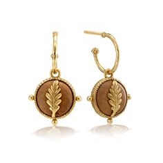 Inspired by walks in the forest, a pair of classic hoop earrings dangle enchanting oak leaf charms that are embellished with intricate golden details. Easily change the charms to wear either the gold or teak side facing front, to suit your mood. Oak Leaf Earrings, Forest Walk, Double Sided Earrings, Earth Goddess, Oak Leaf, Leaf Charms, In The Forest, Earrings Dangle, Leaf Earrings