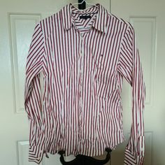 Tommy Hilfiger 8 White Red Stripes Collared Button Up Longsleeves Blouse Tops. Tagged 8 Otherwise Best Fits On Au8-10. Unused. Good Condition. Washed And Sanitised. Tips And Care: 1. Use Laundry Bag Everytime Washing It With Gentle Wash Setting On Washing Machine. 2.Due To Individual Computer Lighting Settings, Actual Color May Differ. 3.Bundle Order And Save Shipping Fee. 4. Please Do Not Hesitate To Message Me If You Have Any Queries. No Account On Poshmark Yet? My Referral Code: @Madeoflovegi Tommy Hilfiger Fitted Long Sleeve Shirt, Tommy Hilfiger Long Sleeve Work Shirt, Tommy Hilfiger Long Sleeve Shirt For Work, Red Long Sleeve Blouse With Button Closure, Tommy Hilfiger Red Long Sleeve Shirt, Tommy Hilfiger Classic Fitted Shirt, Classic Tommy Hilfiger Striped Tops, Fitted Classic Tommy Hilfiger Shirt, Classic Fitted Tommy Hilfiger Shirt