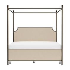 an iron bed frame with white sheets and pillows on it, against a white background