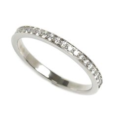 a white gold wedding ring with channeled diamonds