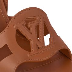 LOUIS VUITTON® - Lv Isola Sandal - Cognac Fall Winter Essentials, Trunk Bag, Louis Vuitton Official, Wallet Pouch, Monogram Bag, Business Bag, Fashion Jewelry Earrings, Wallet Chain, Modern Earrings