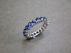 Eternity Blue Sapphire Ring in White Gold - HN JEWELRY Blue Sapphire Eternity Ring, Eternity Ring Sapphire, Ruby Eternity Ring, Sapphire Wedding Ring Set, Unending Love, Sapphire Eternity Band, Sapphire Eternity Ring, Stack Rings, Sapphire Wedding Rings