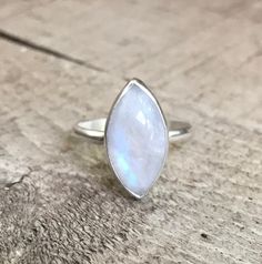 Elegant Romantic Marquise Rainbow Moonstone in Sterling Silver | Moonstone Ring | Eyelet Silver Ring | June Birthstone Ring by GildedBug on Etsy Adjustable Teardrop Moonstone Ring In Sterling Silver, White Marquise Cut Stackable Jewelry, White Stackable Marquise Cut Jewelry, Silver Marquise Moonstone Ring, White Marquise Cut Gemstone Jewelry, Moonstone Marquise Jewelry As A Gift, Moonstone Marquise Jewelry For Gift, Silver Marquise Minimalist Rings, Marquise White Sterling Silver Ring