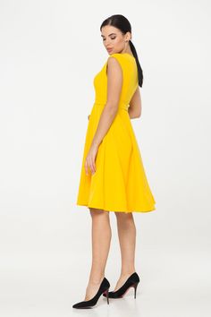 "A cocktail dress featuring a fit and flare silhouette, midi length and cap sleeves. - fit and flare silhouette - round v neck - knee length (midi) - cap sleeves - fabric belt - lined bodice - concealed zipper in side seam - perfect viscose fabric (comfortable and soft to touch) - Color: yellow Fiber: 60% viscose, 35% polyester, 5% elastane, lining - 95 % viscose, 5 % elastane. For size S:dress length- 40,0 \" (102 cm) Our model wears size S (US 6) and is 171cm/5'6\" tall You may feel free choos Fit And Flare V-neck Dress With Pleated Waist, V-neck Fit And Flare Dress With Pleated Waist, Elegant Yellow A-line Sleeveless Dress, Flattering V-neck Dress With Fitted Waist, V-neck Dress With Fitted Waist And Flattering Silhouette, Knee-length Fit And Flare Midi Dress, Fit And Flare Sleeveless Midi Cocktail Dress, Sleeveless Fit And Flare Tea Length Dress, A-line Midi Dress With Pleated Waist