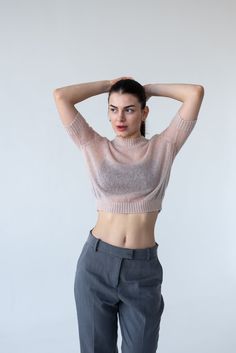 Light mohair knitted crop sweater a stylish addition to your look! Elevate your summer wardrobe with our Light Mohair Knit Top. Crafted with a luxurious mohair, this T-shirt exudes refined elegance and breezy comfort.  Very light, transparent and tender wool pullover. Material: 70% super kid mohair, 30% polyamide.  The color of the top is white natural, not bleached. Please note, due to difference in monitors and brightness level, colours may slightly vary. Super kid mohair is a natural material, it is a yarn made from the hair of the Angora goat. If you have very sensitive skin, you can feel the discomfort from contacting the yarn with the skin. In this case, we advise wearing mohair's things over a shirt or blouse. If you want to make a personal order, you can request the desired color. Knitted Crop Sweater, Knit Summer, Crop Pullover, Angora Goats, Mohair Knit, Wool Pullover, Cropped Pullover, Sweater For Women, Crop Sweater