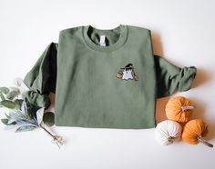 Embroidered Ghost sweatshirt, Halloween Sweatshirt.  We are proud to only use top quality fabric to insure softness and durability. All of our items are handmade in the U.S.A. We have been printing shirts since 2016 from our small shop please shop with confidence!  PROCESSING TIME: Important embroidered items take 2-4 business days. Processing times are always accurately updated and posted and can be found at checkout. Once your order ships out you will receive a tracking number for your order. Embroidered Ghost, Embroidered Items, Ghost Sweatshirt, Ghost Shirt, Sweatshirt Halloween, Sweatshirt Cute, Embroidered Sweatshirt, Halloween Sweatshirt, Embroidered Sweatshirts