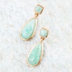 Upgrade your earring game with our Smooth Teardrop Earrings in Amazonite. Made of genuine green Amazonite and bronze, these handcrafted beauties feature a teardrop amazonite stone hanging from a square stone, with a high polish bronze bezel. At just 1.1" and .4" at its widest, these earrings are both lightweight with each earring only weighing .11oz. and stylish! Natural variances are part of the beauty of our genuine stones. Your piece will vary slightly from the image shown. Green Amazonite, Lapis Ring, Amazonite Stone, Square Stone, Bronze Ring, Turquoise Green, Green Stone, Beautiful Love, Teardrop Earrings