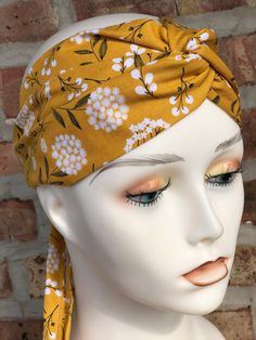 This is a very stylish turban headband made with 100 % High-Quality Cotton Fabric. It is one size fits all since I made it with adjustable straps. Great as an everyday hair accessory at home, workout, going outdoors...! It is very comfortable and non-slip and good for long or short hair! No returns or exchanges are accepted but message me if you have a problem with the order. Thank you for supporting my small home-based business. Adjustable Headwrap For Summer Beach, Adjustable Headwrap For Beach In Summer, Adjustable Beach Headwrap For Summer, Summer Knotted Headscarf, Adjustable Summer Beach Headwrap, Casual Spring Headband, Casual Summer Turban, Adjustable Yellow Headscarf In Headband Shape, Adjustable Yellow Headscarf Headband