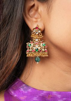 Experience exceptional craftsmanship with our Ahmedabadi Kundan stone in green, White  and red with Birds design jadau Earrings featuring a single green dangling bead. Crafted with precision and elegance, these Earrings are the epitome of timeless beauty. Note: This jewelry has no precious metals or stones. Note: Some of the pics are close up shots to show detail and may make the product appear larger. Please refer to the measurements picture for better perspective on size. Multicolor Kundan Bridal Earrings With Intricate Design, Multicolor Kundan Chandbalis With Intricate Design, Green Kundan Chandbali Jewelry, Green Kundan Jewelry With Matching Earrings, Green Jewelry With Matching Earrings For Festivals, Ruby Latkans Temple Jewelry, Multicolor Kundan Danglers With Intricate Design, Multicolor Intricate Earrings For Navratri, Multicolor Temple Jewelry Danglers With Intricate Design