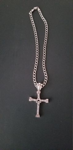 "Sterling 925 Silver Cross/Pendent with 925 Sterling Chain. A very beautiful Estate find. I don't know if the diamonds are real but they sure do look like it, Maybe Cubic Zirconia. It has a very nice large Bale 3/4\" The Cross has movable arms and a movable bottom. See Photos. I don't know the true age of it as it was an estate find. If you have any questions please Convo me  It is important for me to have satisfied customers.  You never know what you will find in my store  As always, Thank you for looking into ABlastInThePastVintg" Iced Out Metal Pendant Jewelry, Silver Diamond Cross Pendant Jewelry, Silver Cuban Link Bling Necklace, Silver Cross Pendant Necklace With Box Chain, Elegant Iced Out Cross Pendant Jewelry, Sterling Silver Cuban Link Necklace With Bling, Silver Cross Diamond Jewelry, Sterling Silver Cross Box Chain Necklace, Silver Diamond Cross Jewelry