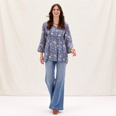 Embrace bohemian charm and effortless style with the Jasmine Blue Bohemian Tunic. Crafted from 100% viscose, this tunic offers both comfort and breathability, perfect for all-day wear. The vibrant blue pattern adds a lively touch to your look, making it a standout piece in your wardrobe. The 3/4 sleeves provide a relaxed yet polished look, while the inner lace detail on the placket adds a touch of femininity and elegance. Featuring a half placket adorned with shell buttons, this tunic exudes und Beach Towel Gift, Bohemian Tunics, Paper Cocktail Napkins, Cloth Cocktail Napkins, Eco Friendly Clothing, Shell Buttons, Vibrant Blue, Polished Look, Blue Pattern