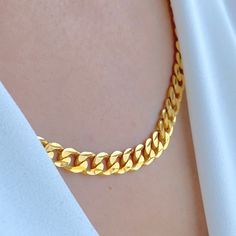 PRODUCT DETAILS Gold Purity(karat): 22k Gold Weight(grams): 57.2 Item Finish: Yellow Gold Chain Length: 22" Chain Width(mm): 5.5 Lock Style: Lobster Lock 22k Gold Link Chain Necklace, 22k Gold Figaro Chain Necklace, 22k Gold Link Chain Necklace For Formal Occasions, Formal 22k Gold Link Chain Necklace, Lock Style, Yellow Gold Chain, Cuban Link Chain, Cuban Link, 22k Gold