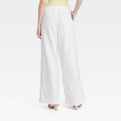 These High-Rise Wide-Leg Linen Pull-On Pants from A New Day™ make a great pick for warm-weather wear. Fashioned in comfortable wide-leg silhouette, they bring relaxed style to your look. The functional drawstring on the pull-on waist lets you get the perfect fit with every wear, and the functional pockets provide space for on-the-go essentials. A New Day™: Style that goes wherever you do. Cotton Wide Leg Pants With Pull-on Style, Comfortable Spring Bottoms For Day Out, Relaxed Fit Wide Leg Pull-on Pants, Relaxed Fit Pull-on Wide Leg Pants, Relaxed Wide Leg Pants With Pull-on Style For Spring, Comfortable Wide Leg Summer Pants, Comfortable Wide Leg Pants For Summer, Comfortable Summer Wide Leg Pants, Non-stretch Comfortable Wide Leg Pants For Summer