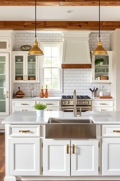 Modern kitchen with white cabinets, farmhouse sink, subway tile backsplash, and exposed wooden beams above. Cabin Vibes, Steel Finishes