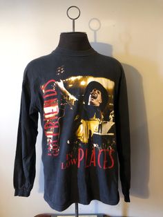 "Garth Brooks Long Sleeve  - Garth Brooks Live in concert graphic  - I've Got Friends In Low Places spell out  - Blame It All On My Roots spell out back  - Rare 90s vintage shirt  - Hanes tagged  - Distressing on graphic/vintage fade  Size: XL 23\" pit to pit  30\" shoulder to waist  21\" inseam sleeve  24\" top sleeve to cuff  Great vintage condition  No rips or holes  No stains" Garth Brooks Songs, Concert Graphic, Beer Hoodie, Friends In Low Places, Cowichan Sweater, Western Tee, Country Music Shirts, My Roots, Garth Brooks