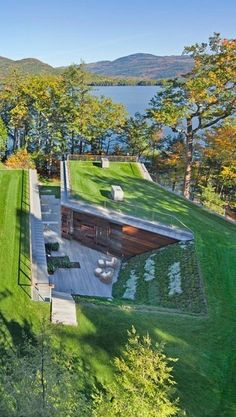 this is an aerial view of a house in the hills near lake champal, france