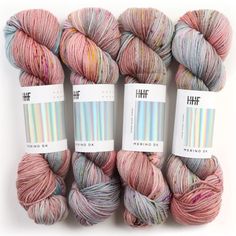 three skeins of yarn in different colors