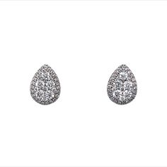 Petit Pear Shaped Earrings w/ Diamonds 14K White Gold These modern cluster earrings feature .48 carats of diamonds and are finished in 14 karat white gold. The clusters are pear shaped with smaller diamonds outlining the border and larger stones in the center. These would be great for everyday wear and fancy evening wear as well! Primary Stone: Genuine Natural Diamond Shape and Measurements: 1.15 mm = .006 ct(70) Color: G/H Clarity: VS2 / SI1 Stone Weight: .48 ct General Characteristics: Measure Dazzling Cluster Diamond Earrings For Formal Occasions, Dazzling Cluster Diamond Earrings For Formal Events, Platinum Cluster Diamond Earrings For Formal Occasions, Timeless Formal Diamond Cluster Earrings, Formal Platinum Cluster Earrings With Diamond Accents, Formal Vvs Clarity Diamond Cluster Earrings, Formal Cluster Diamond Earrings With Brilliant Cut, Classic Diamond Cluster Earrings For Formal Events, Formal Cluster Earrings With Diamond Accents In Platinum