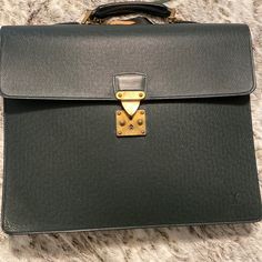 Beautiful Piece. I Don’t Use The Bag And She Deserves Someone Who Will Take Her Out! Has Visible Signs Of Wear On Inside And Outside Of Bag. Lock Works. Comes With 2 Keys. Includes An Unbranded Black Strap. Can Easily Be Removed. Luxury Green Satchel Briefcase, Classic Green Satchel With Branded Hardware, Designer Green Shoulder Bag For Business, Green Business Satchel With Gold-tone Hardware, Designer Green Business Bag, Luxury Green Bag For Business, Vintage Green Satchel For Formal Occasions, Luxury Green Satchel For Business, Designer Business Briefcase With Branded Hardware