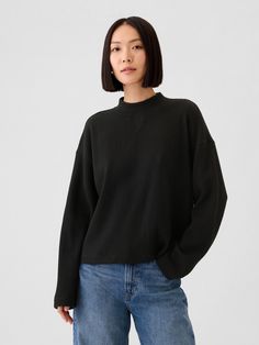 Soft, stretch waffle-knit over Casual Textured Knit Turtleneck Top, Casual Textured Knit High Neck Turtleneck, Textured Knit Turtleneck Top For Layering, Casual Stretch Ribbed Mock Neck Top, Textured Knit High Neck Top For Layering, Stretch Textured Knit High Neck Top, High Neck Textured Knit Top For Layering, Stretch High Neck Textured Knit Top, Ribbed Collar Turtleneck Top For Layering