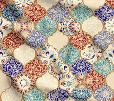 an intricately designed wallpaper with blue, red and white tiles on it's surface