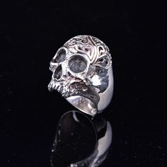 "Borneo Head Hunter Skull Ring, Best Gift for Boyfriend On the top of the skull ring's head, there is an engraving with a typical Borneo Dayak motif Material: Silver 92,5% Best gift for birthday, anniversary Gender: Men's, unisex Style: Tribe art, gothic, biker's ring Size: 6-13 USA Free Shipping worldwide This skull ring inspired by The Dayak, from Borneo Island Indonesia tradition of headhunting practices. Among the Iban Dayak, the origin of headhunting was believed to be one of the mourning r Silver Skull Ring For Halloween Streetwear, Adjustable Symbolic Skull Ring, Adjustable Skull Print Ring For Halloween, Halloween Skull Print Ring As A Gift, Halloween Skull Print Rings, Symbolic Skull Rings For Halloween, Gothic Silver Skull Ring, Halloween Skull Rings Symbolic Style, Halloween Skull Ring Gift