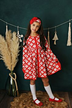 Swoon Baby Winter Floral Prim Pocket Dress Style 21-62 (Dress only). Headband & knee high socks sold separately. We do not offer these accessories in our shop. Ready to ship! This beautiful dress is made of high quality knit fabric. Swoon Baby knits are extremely soft and comfortable. This dress pairs perfectly with knee high socks. Sizing: Swoon Baby fits true to size and the tunics have extra length for longer wear. If you have any questions or need a measurement please contact our shop at 214 Cute Long Sleeve Holiday Dress, Cute Long Sleeve Festive Dresses, Playful Long Sleeve Christmas Dress, Cute Long Sleeve Holiday Dress For Festive Occasion, Cute Long Sleeve Festive Holiday Dress, Playful Cotton Winter Dress, Cute Winter Dress-up Dresses, Cute Winter Dress For Dress-up, Playful Long Sleeve Holiday Dress