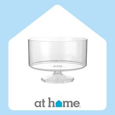 an image of a glass bowl on top of a stand with the words at home above it