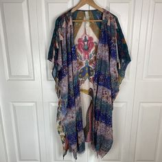 Great Condition, No Stains, Holes, Or Flaws. Pit To Pit 36 Inches. Length From Shoulder To Hem 45 Inches. Multicolor Spring Kaftan With Back Tassel Tie-up, Spring Multicolor Kaftan With Tassels, Bohemian Multicolor Kaftan With Back Tassel Tie-up, Bohemian Festival Kimono With Tassel Ties, Multicolor Kimono With Tassel Details, Blue Bohemian Kimono With Boho Print, Multicolor Kimono With Tassels, Blue Hippie Kimono For Beach Cover-up, Hippie Style Blue Kimono For Festivals