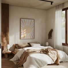 a bedroom with a large bed and white sheets on top of the bedspread